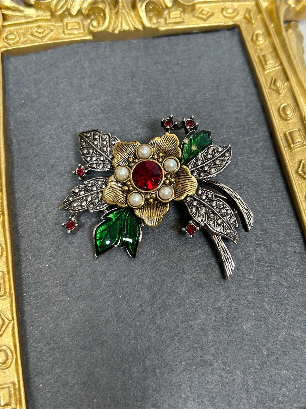 Vintage Avon Silver & Gold Floral Brooch with Red Crystal and Green Enamel Leave